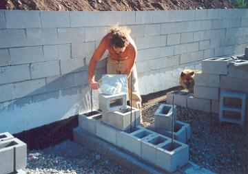 Rebar comes out of the concrete footer every third core in this wall design