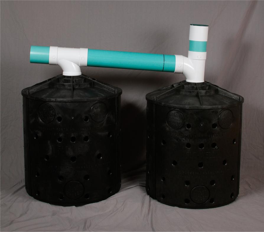 Two drywell kits installed in series allows first drywell to accumulate solids, protecting longevity of the second, overflow drywell.