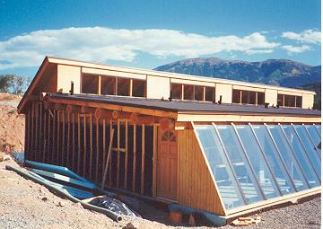 Exterior walls are mop-coated for waterproofing and then 2by4 sleepers are anchored and glued in place