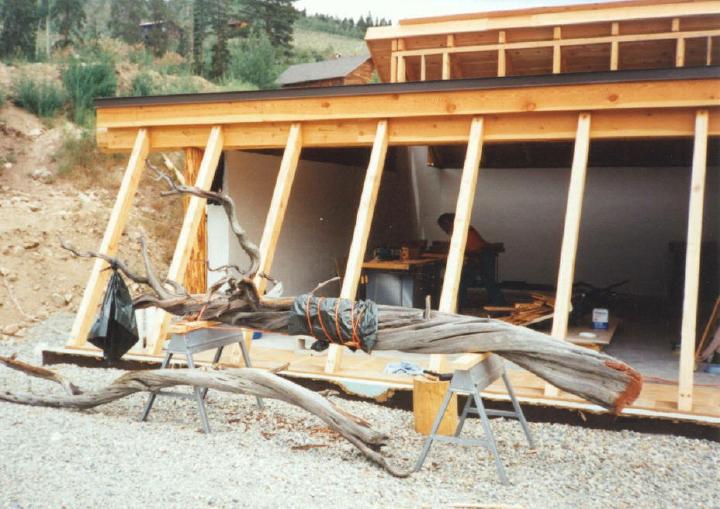 South face of HTM with sloped 4by6 timbers awaiting greenhouse style glass for the interior planterbed