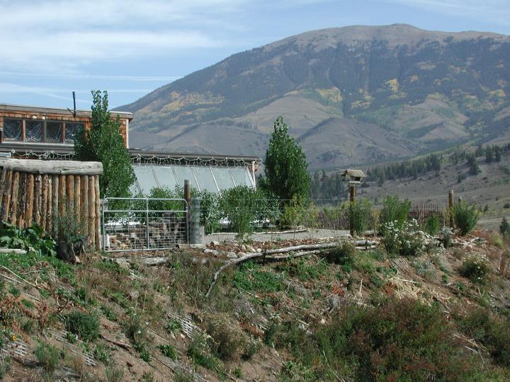 Attached greenhouses are standard practice for high thermal mass HTM passive solar sustainable house designs