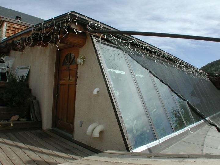 htmshadecloth Shade cloth sun screen trellis to create micro-climate outside of glass and reduce solar gain in the summer months