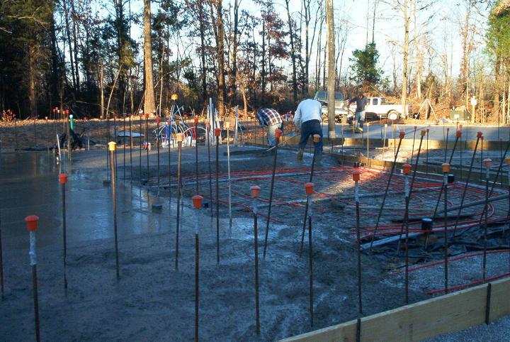 Radiant in-floor heat tubing is poured right into the slab.